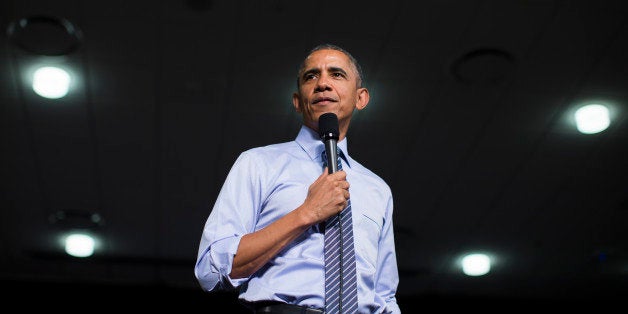 President Barack Obama answers questions during an event at Ivy Tech Community College, Friday, Feb. 6, 2015, in Indianapolis