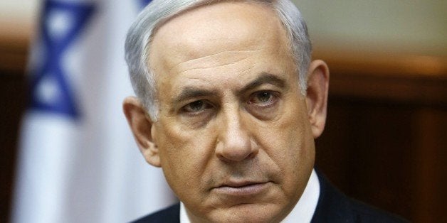 Israeli Prime Minister Benjamin Netanyahu looks on as he opens the weekly cabinet meeting at his Jerusalem office on February 1, 2015. AFP PHOTO / POOL / GALI TIBBON (Photo credit should read GALI TIBBON/AFP/Getty Images)