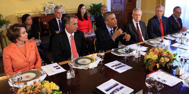 WASHINGTON, DC - NOVEMBER 07: U.S. President Barack Obama meets with bipartisian congressional leadership in the Old Family Dining Room at the White House November 7, 2014 in Washington, DC. Obama talked about the positive economic news and what priorities his administration will be focused on after last Tuesday's election, where the Republicans won a decisive victory in local, state and national races. (Photo by Dennis Brack-Pool/Getty Images)