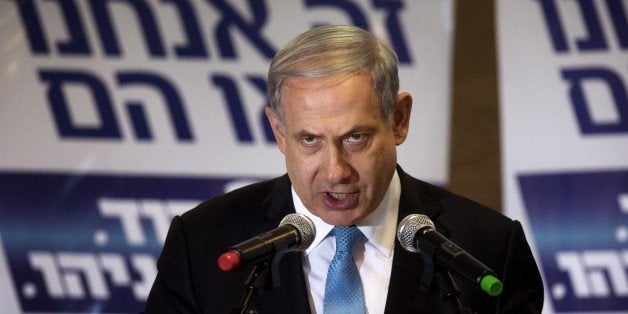 Israeli Prime Minister and Likud party leader Benjamin Netanyahu delivers a speech to his supporters during an election campa