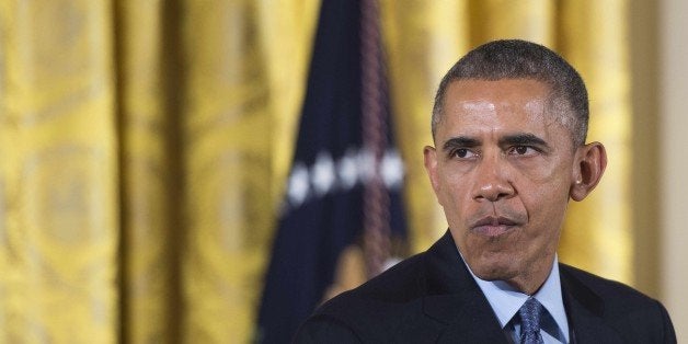 US President Barack Obama speaks before signing the Clay Hunt Suicide Prevention for American Veterans Act, H.R. 203, in the East Room of the White House in Washington, DC, February 12, 2015. AFP PHOTO/JIM WATSON (Photo credit should read JIM WATSON/AFP/Getty Images)