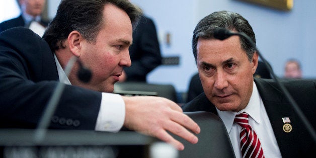 UNITED STATES - JANUARY 27: Rep. Alex Mooney, R-W. Va., left, speaks with Rep. Gary Palmer, R-Ala., before the start of the H