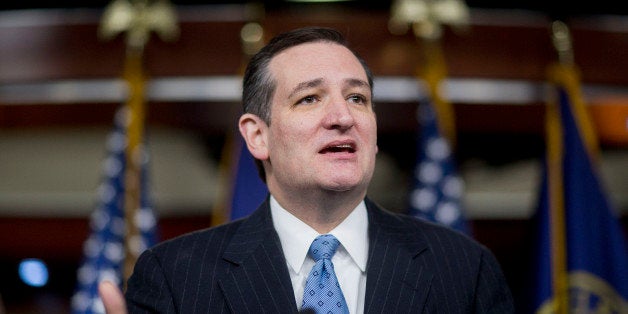 Senator Ted Cruz, a Republican from Texas, speaks during a news conference on the Department of Homeland Security (DHS) funding bill with Representative John Carter, a Republican from Texas, right, in Washington, D.C., U.S., on Thursday, Feb. 12, 2015. The DHS is operating under a continuing resolution that expires on Feb 27 with a stalemate over whether the must-pass measure should carry riders to upend President Barack Obama's immigration policies continuing to threaten passage of the legislation. Photographer: Andrew Harrer/Bloomberg via Getty Images