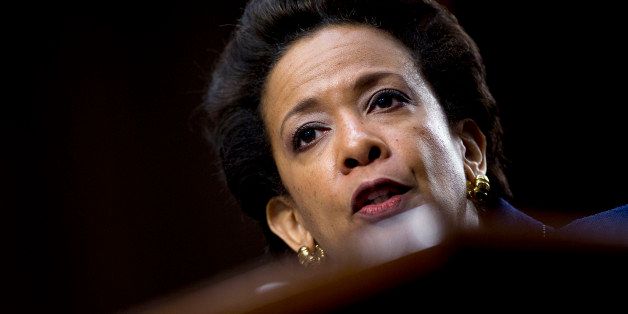Loretta Lynch, Brooklyn prosecutor and nominee to replace U.S. Attorney General Eric Holder, speaks during a Senate Judiciary Committee nomination hearing in Washington, D.C., U.S., on Wednesday, Jan. 28, 2015. Lynch said that if confirmed as the next U.S. attorney general she would focus on battling cybercrime and improving relations between police and the communities they serve. Photographer: Andrew Harrer/Bloomberg via Getty Images 