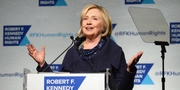 NEW YORK, NY - DECEMBER 16: Honoree Hillary Rodham Clinton speaks onstage at the RFK Ripple Of Hope Gala at Hilton Hotel Mid