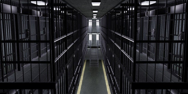 Dutch angle view looking up at the empty cells in a multi-tiered prison