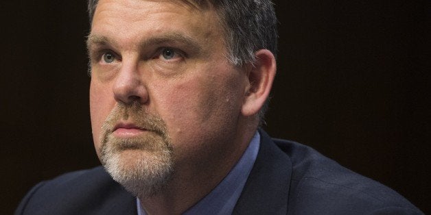 Nicholas Rasmussen, Director of the National Counterterrorism Center, testifies during a US Senate Select Committee on Intelligence hearing on Capitol Hill in Washington, DC, February 12, 2015. AFP PHOTO / SAUL LOEB (Photo credit should read SAUL LOEB/AFP/Getty Images)