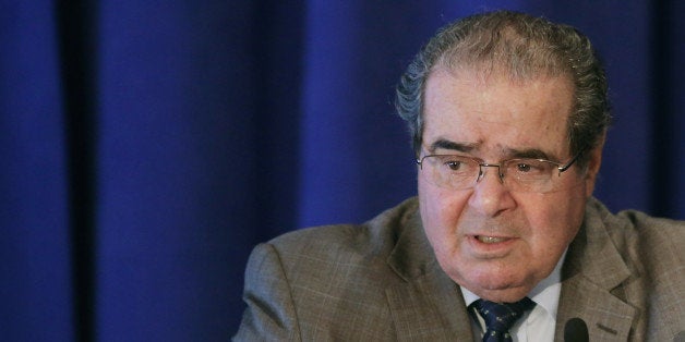 WASHINGTON, DC - SEPTEMBER 15: U.S. Supreme Court Associate Justice Antonin Scalia addresses the Legal Services Corporation's 40th anniversary conference luncheon Septemeber 15, 2014 in Washington, DC. Former Secretary of State Hillary Clinton is also scheduled to address the LSC, which was established by the Congress in 1974 'to provide equal access to justice and to ensure the delivery of high-quality civil legal assistance to low-income Americans.' (Photo by Chip Somodevilla/Getty Images)