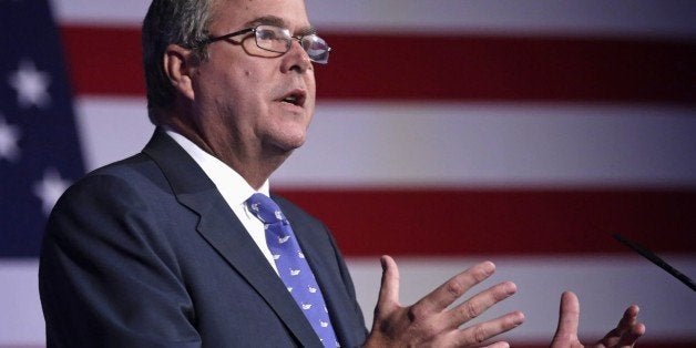 Former Florida Gov. Jeb Bush speaks at the American Legislative Exchange Council's 40th annual meeting, Friday, Aug. 9, 2013, in Chicago. Bush defended new achievement standards for students around the nation while calling for an expansion of school-choice initiatives in states. (AP Photo/M. Spencer Green)