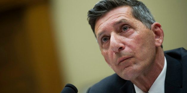 Michael Botticelli, deputy director, Office of National Drug Control Policy, listens while testifying on Capitol Hill in Washington, Tuesday, Feb. 4, 2014, before the House Government Operations subcommittee hearing to examine the administration's marijuana policy. (AP Photo/Cliff Owen)