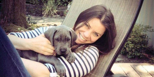 FILE - This undated file photo provided by the Maynard family shows Brittany Maynard, a 29-year-old terminally ill woman who planned to die under Oregon's law that allows the terminally ill to end their own lives. The Vatican's top bioethics official calls "reprehensible" the suicide of an American woman suffering terminal brain cancer who stated she wanted to die with dignity. Monsignor Ignacio Carrasco de Paula, the head of the Pontifical Academy for Life, reportedly said Tuesday, Nov. 4, 2014 that "dignity is something other than putting an end to one's own life." Brittany Maynard's suicide in Oregon on Saturday, following a public declaration of her motives aimed at sparking political action on the issue, has stirred debate over assisted suicide for the terminally ill. (AP Photo/Maynard Family, File)