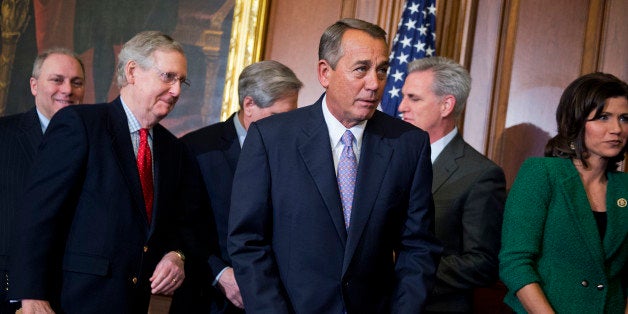 UNITED STATES - FEBRUARY 13: From left, House Majority Whip Steve Scalise, R-La., Senate Majority Leader Mitch McConnell, R-Ky., Sen. John Hoeven, R-N.D., Speaker John Boehner, R-Ohio, House Majority Leader Kevin McCarthy, R-Calif., and Rep. Kristi Noem, R-S.D., wrap up a bill signing ceremony for the Keystone XL Pipeline Approval Act, in the Capitol's Rayburn Room, February 13, 2015. (Photo By Tom Williams/CQ Roll Call)