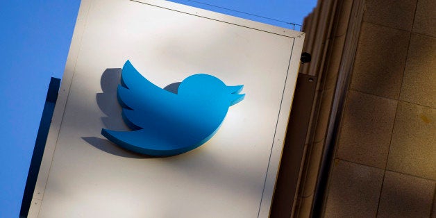 The Twitter Inc. logo is displayed on the facade of the company's headquarters in San Francisco, California, U.S., on Thursda