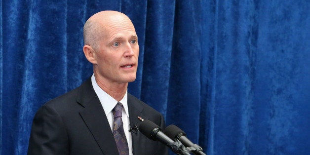 Florida Gov. Rick Scott speaks to the media during a pre-legislative news conference, Wednesday, Jan. 28, 2015, in Tallahassee, Fla. (AP Photo/Steve Cannon)