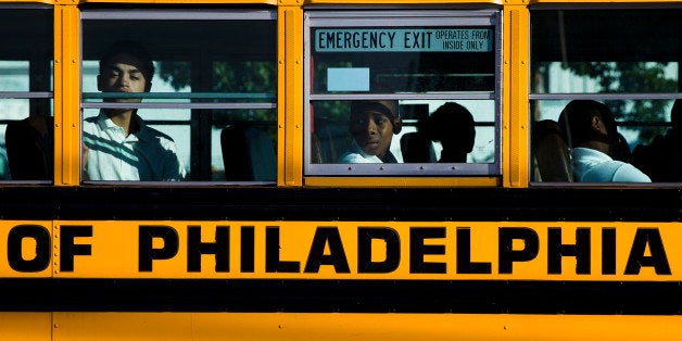 Students arrive for school Monday, Sept. 8, 2014, in Philadelphia. Philadelphia opened three new public high schools Monday i