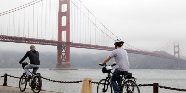 Bicyclists ride to the Golden Gate Bridge in San Francisco, Wednesday, Aug. 3, 2011. Golden Gate Bridge officials have skirte