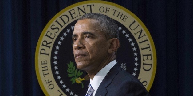 US President Barack Obama delivers remarks on countering violent extremism in Washington, DC, February 18, 2015. Obama urged Western and Muslim leaders to unite to defeat the 'false promises of extremism, saying they must jointly reject the premise that jihadist groups represent Islam. AFP PHOTO/JIM WATSON (Photo credit should read JIM WATSON/AFP/Getty Images)