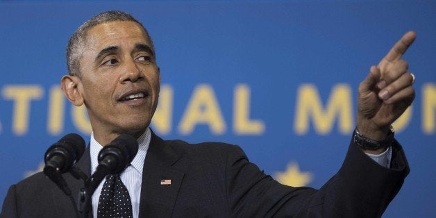 US President Barack Obama speaks at Gwendolyn Brooks College Preparatory Academy in Chicago, Illinois, February 19, 2015. Obama designated the Pullman Historic District as a National Monument. The district was founded by railroad car manufacturer, engineer and industrialist George Pullman in 1880. AFP PHOTO/JIM WATSON (Photo credit should read JIM WATSON/AFP/Getty Images)