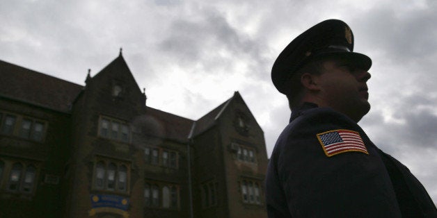 WALLKILL, NY - NOVEMBER 24: A prison guard stands at the entrance of the Wallkill Correctional Facility in Ulster County on