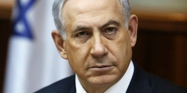 Israeli Prime Minister Benjamin Netanyahu looks on as he opens the weekly cabinet meeting at his Jerusalem office on February 1, 2015. AFP PHOTO / POOL / GALI TIBBON (Photo credit should read GALI TIBBON/AFP/Getty Images)