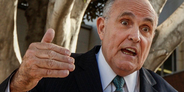 Lawyer and former New York City Mayor Rudy Giuliani comments on a lawsuit filed against video game giant Activision by former Panamanian dictator Manuel Noriega outside Los Angeles Superior court in Los Angeles Thursday, Oct. 16, 2014. Noriega claims his likeness was used without permission in "Call of Duty: Black Ops II" and he was portrayed as a murderer and enemy of the state. Activision attorneys said allowing the case to proceed would make it difficult to include historical figures in games, books and other creative works. Los Angeles Superior Court Judge William F. Fahey did not signal during an hour long hearing Thursday how he might rule. (AP Photo/Damian Dovarganes)