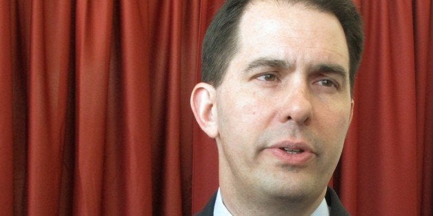 Gov. Scott Walker talks about the release of the first television ad run against him by Democratic challenger Mary Burke on W