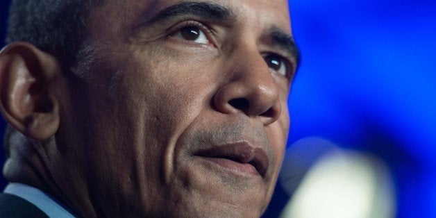 US President Barack Obama addresses the General Session of the 2015 Democratic National Committee (DNC) Winter Meeting in Washington, DC, on February 20, 2015. AFP PHOTO/NICHOLAS KAMM (Photo credit should read NICHOLAS KAMM/AFP/Getty Images)