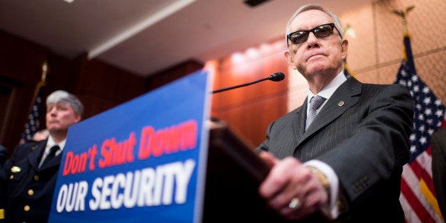 UNITED STATES - FEBRUARY 24: Senate Minority Leader Harry Reid, D-Nev., speaks during the Senate Democratic Caucus' news conference with first responders to discuss support for a 'clean bill' to fund the Homeland Security Department on Tuesday, Feb. 24, 2015. (Photo By Bill Clark/CQ Roll Call)