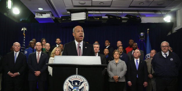 WASHINGTON, DC - FEBRUARY 23: U.S. Secretary of Homeland Security Jeh Johnson speaks as employees of the Homeland Security Department look on during a news conference February 23, 2015 in Washington, DC. Secretary Johnson called on the Congress to pass a full-year appropriations bill to fund the Homeland Security Department. (Photo by Alex Wong/Getty Images)