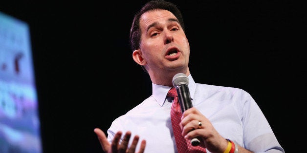 DES MOINES, IA - JANUARY 24: Wisconsin Gov. Scott Walker speaks to guests at the Iowa Freedom Summit on January 24, 2015 in Des Moines, Iowa. The summit is hosting a group of potential 2016 Republican presidential candidates to discuss core conservative principles ahead of the January 2016 Iowa Caucuses. (Photo by Scott Olson/Getty Images)