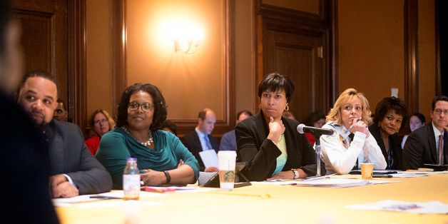 WASHINGTON, DC- FEBRUARY 24:Mayor Muriel Bowser (D) (Center) and D.C. Police Chief Cathy L. Lanier laid out the contours of how District police plan to respond to the Initiative 71 laws changes at the Wilson Building in Washington, D.C. on February 24, 2015. AT LEFT of Mayor Bowser is District of Columbia Schools Chancellor Kaya Henderson.(Photo by Marvin Joseph/The Washington Post via Getty Images)