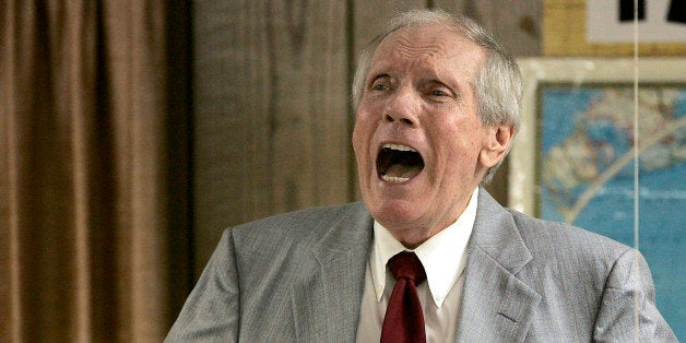 FILE - In this March 19, 2006 file photo, the Rev. Fred Phelps Sr. preaches at his Westboro Baptist Church in Topeka, Kan. Ph