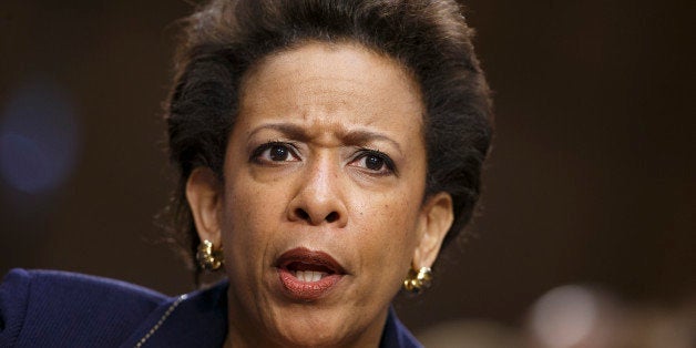 Attorney General nominee Loretta Lynch testifies on Capitol Hill in Washington, Wednesday, Jan. 28, 2015, before the Senate Judiciary Committee's hearing on her nomination. Lynch defended President Barack Obama's decision to shelter millions of immigrants from deportation though they live in the country illegally but she said they have no right to citizenship under the law. If confirmed, Lynch would become the nation's first black female attorney general. It is the first confirmation proceeding since Republicans took control of the Senate this month. (AP Photo/J. Scott Applewhite)