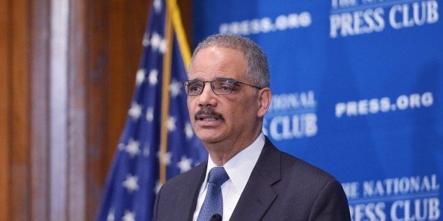 US Attorney General Eric Holder speaks on criminal justice and sentencing reform at the National Press Club on February 17, 2
