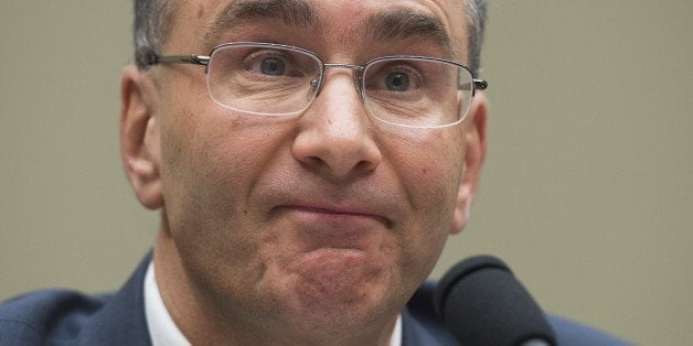 Jonathan Gruber, an economics professor at Massachusetts Institute of Technology (MIT) and a consultant on the drafting of the Affordable Care Act legislation known as 'Obamacare,' testifies during a US House Committee on Oversight and Government Reform hearing on Capitol Hill in Washington, DC, December 9, 2014. AFP PHOTO / SAUL LOEB (Photo credit should read SAUL LOEB/AFP/Getty Images)