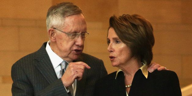 WASHINGTON, DC - SEPTEMBER 10: U.S. Senate Majority Leader Sen. Harry Reid (D-NV) (L) talks to House Minority Leader Rep. Nancy Pelosi (D-CA) (R) after a Congressional Gold Medal presentation ceremony at the Emancipation Hall of the U.S. Capitol Visitors Center September 10, 2014 on Capitol Hill in Washington, DC. The Congressional Gold Medal was awarded in honor to the men and women who were killed during the September 11th attacks for their heroic sacrifices. One of the three medals will be provided to the Flight 93 National Memorial in Pennsylvania, the second will go to the National September 11 Memorial and Museum in New York, and the third one will be directed to the Pentagon Memorial at the Pentagon. (Photo by Alex Wong/Getty Images)