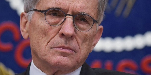 Federal Communications Commission Chairman Tom Wheeler listens to a speaker during a FCC hearing on the net neutrality on February 26, 2015 in Washington, DC. AFP PHOTO/MANDEL NGAN (Photo credit should read MANDEL NGAN/AFP/Getty Images)