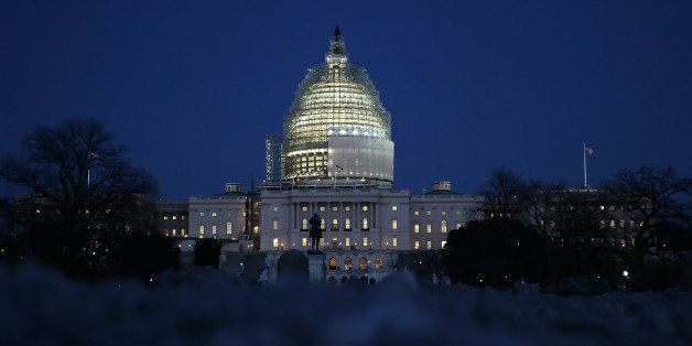 WASHINGTON, DC - FEBRUARY 27: The U.S. Capitol is seen at dusk as the U.S. Congress struggles to find a solution to fund the Department of Homeland Security on February 27, 2015 in Washington, DC. The DHS budget is set to expire at midnight this evening after the House of Representatives failed to pass a short term funding bill earlier today. (Photo by Win McNamee/Getty Images)