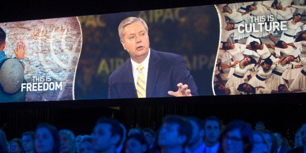 Sen. Lindsey Graham, R-S.C., is projected on a large video screen as he speaks at the American Israel Public Affairs Committee (AIPAC) Policy Conference in Washington, Sunday, March 1, 2015. (AP Photo/Cliff Owen)