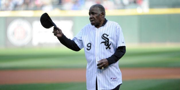 CHICAGO, IL - APRIL 26: Former Chicago White Sox player Minnie Minoso throws out the first pitch before the game between the Chicago White Sox and the Tampa Bay Rays on April 26, 2014 at U.S. Cellular Field in Chicago, Illinois. (Photo by David Banks/Getty Images) 