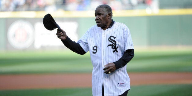 CHICAGO, IL - APRIL 26: Former Chicago White Sox player Minnie Minoso throws out the first pitch before the game between the