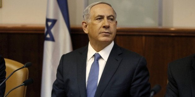 Israeli Prime Minister Benjamin Netanyahu looks on as he opens the weekly cabinet meeting at his Jerusalem office on February 1, 2015. AFP PHOTO / POOL / GALI TIBBON (Photo credit should read GALI TIBBON/AFP/Getty Images)