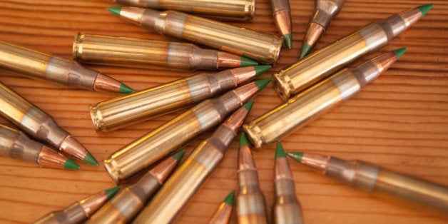 CHICAGO, IL - FEBRUARY 27: Green tipped armor-piercing 5.56 millimeter ammunition is shown on February 27, 2015 in Chicago, Illinois. The Obama administration has proposed banning the ammunition, which is popular among hunters and target shooters, because it can be used in pistols. Fear of a ban has caused a run on sales. (Photo Illustration by Scott Olson/Getty Images)