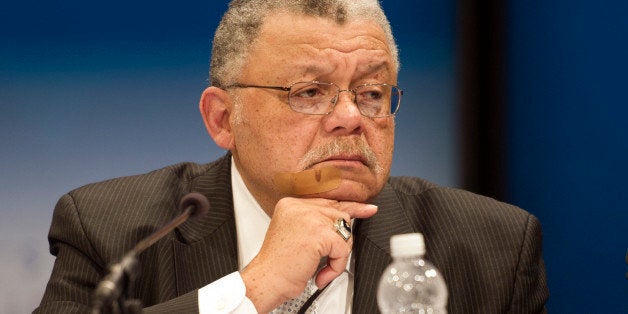 Philadelphia Police Commissioner Charles Ramsey, co-chair, the President's Task Force on 21 Century Policing, listens to witnesses at the Newseum in Washington, Tuesday, Jan. 13, 2015. (AP Photo/Cliff Owen)