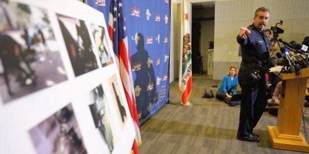 LOS ANGELES, CA - MARCH 2: LAPD Chief Charlie Beck gestures to a series of enhanced photos from the cellphone video of the recent Skid Row shooting at LAPD headquarters, in Los Angeles, Calif., on Mar. 2, 2015. (Photo by Marcus Yam/ LA Times via Getty Images)