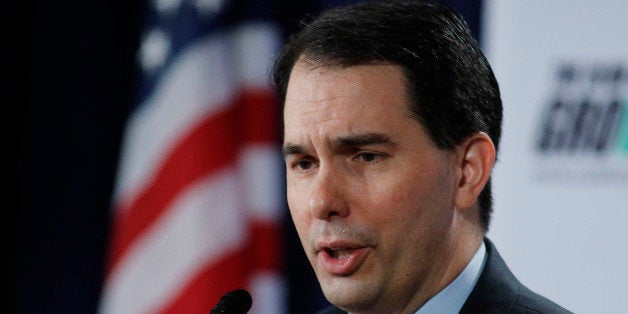 Wisconsin Gov. Scott Walker speaks at the winter meeting of the free market Club for Growth winter economic conference at the Breakers Hotel Saturday, Feb. 28, 2015, in Palm Beach, Fla. (AP Photo/Joe Skipper)