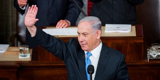 UNITED STATES - MARCH 03: Israeli Prime Minister Benjamin Netanyahu prepares to address a joint meeting of Congress in the House chamber as Speaker John Boehner, R-Ohio, left, and Sen. Orrin Hatch, R-Utah, president pro tempore of the Senate, on look, March 3, 2015. (Photo By Tom Williams/CQ Roll Call)