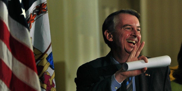 SPRINGFIELD, VA - NOV 07: With his concession speech in hand, Ed Gillespie waved at supporters as he entered the meeting room where moments later he conceded. Virginia Senate candidate Ed Gillespie conceded the race to Mark Warner today at a press conference held at the Waterford Hotel in Springfield, Virginia. His wife Cathy was at his side and there were scores of well-wishers on hand in the hotel meeting room to support him. (Photo by Michael S. Williamson/The Washington Post via Getty Images)