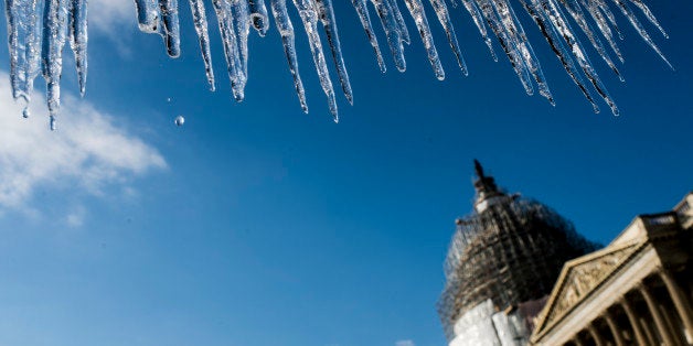 UNITED STATES - MARCH 2: Waters drips from icicles at the U.S. Capitol on Monday morning, March 2, 2015, following an ice sto