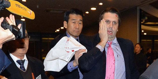 SEOUL, SOUTH KOREA - MARCH 05: (SOUTH KOREA OUT) In this handout image provided by The Asia Economy Daily newspaper, U.S. Ambassador to South Korea Mark Lippert is seen after getting attacked on March 5, 2015 in Seoul, South Korea. Ambassador Lippert was attacked with a razor blade by a man at a venue where he was going to give a lecture. The attacker who reportedly identified himself as a representative for a watchdog organization of the disputed island Dokdo/Takeshima, was arrested immediately on site. (Photo by Handout/The Asia Economy Daily via Getty Images)